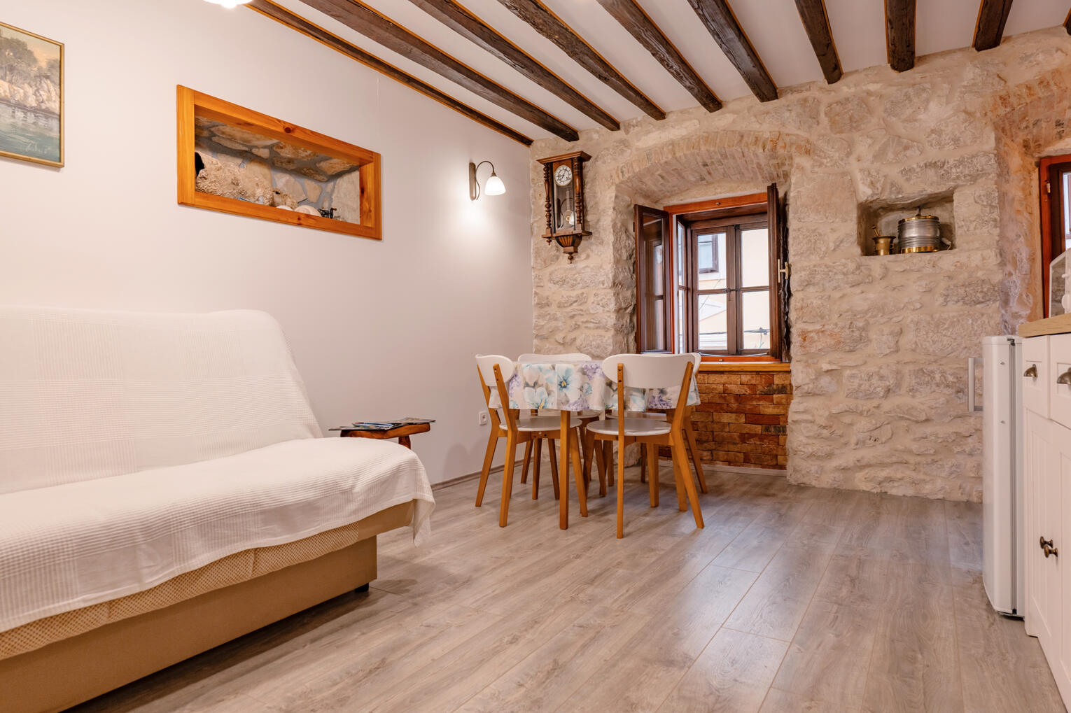 Living room with natural stone wall