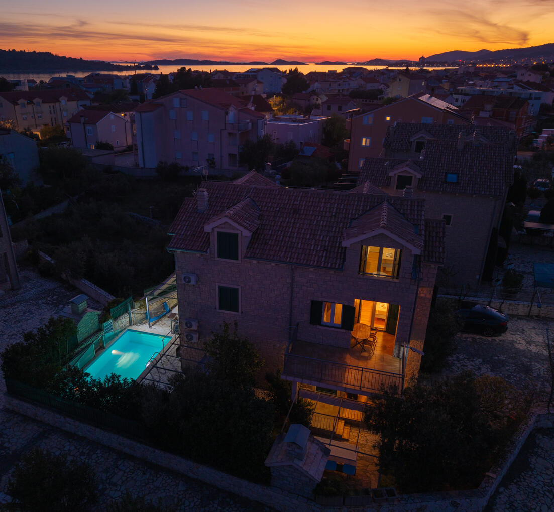 Evening aerial view of the villa
